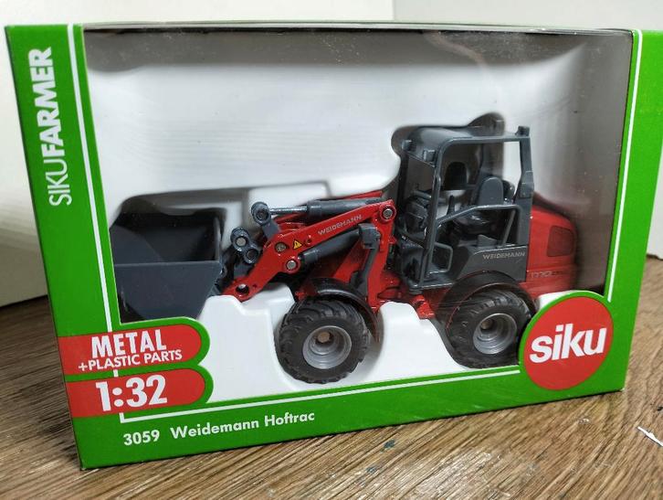 Te koop Siku Weidemann Hoftrac 1770 CX50 shovel Aanbieding., Hobby en Vrije tijd, Modelauto's | 1:32, Nieuw, Tractor of Landbouw