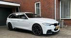 Zeer nette BMW 316I Touring. Nw. Distr. Ketting en nw. APK, Auto's, 74 €/maand, Zwart, Alcantara, Wit