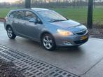 Opel Astra 1.4 Turbo 88KW ST 2012 Grijs, Auto's, Origineel Nederlands, Te koop, Zilver of Grijs, 5 stoelen