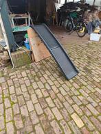 Loopplank hond, Ophalen