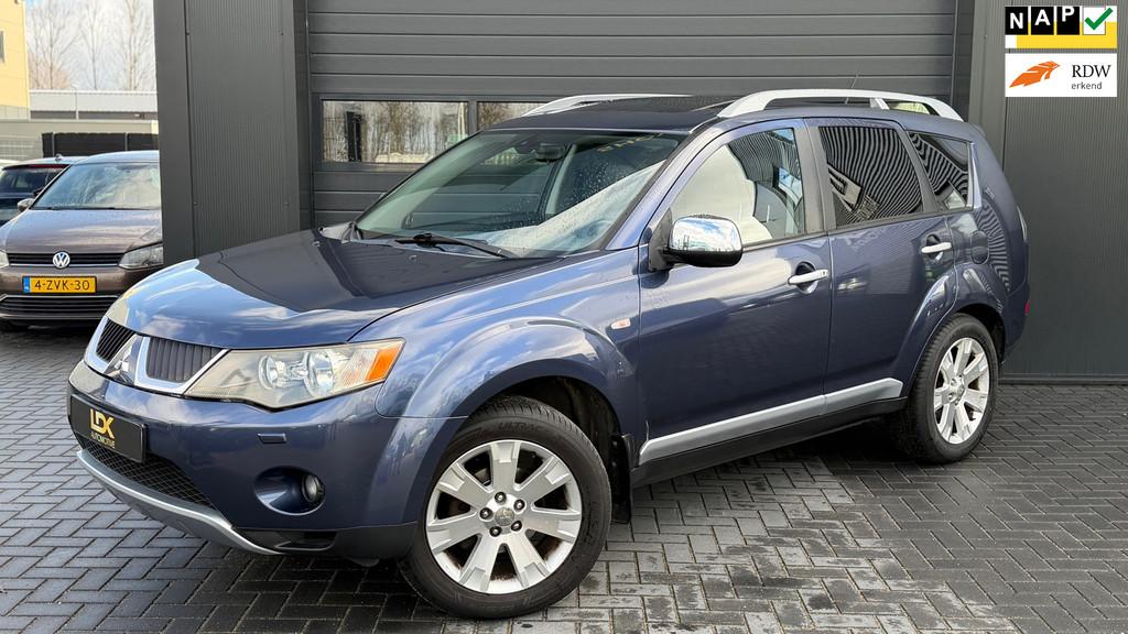 Mitsubishi Outlander 2.4 Instyle Airco|Dakje|Keyles|Leder|4W, Auto's, Mitsubishi, Automaat, 4 cilinders, Blauw, 7 stoelen