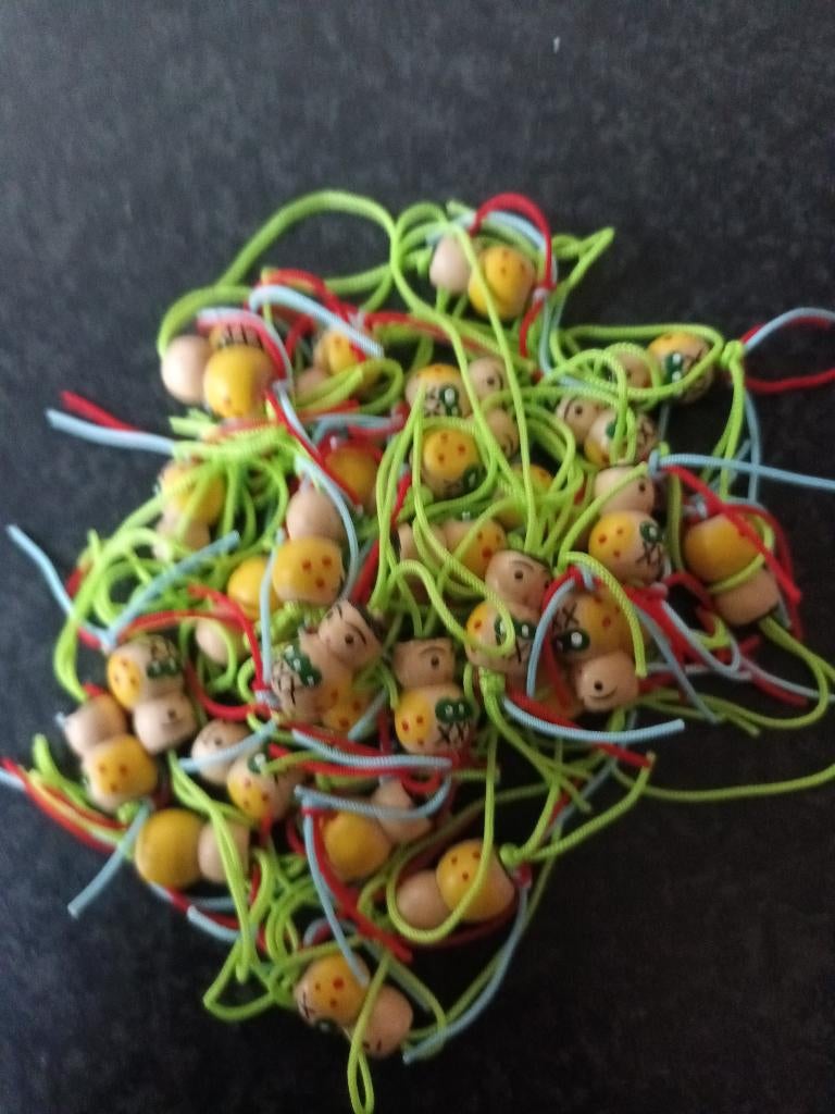 Nieuw gelukspoppetjes 31x geel-groen, Verzamelen, Sleutelhangers, Ophalen of Verzenden, Nieuw