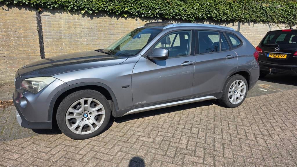 BMW X1 2.0 Sdrive 18I 2011 Grijs, Auto's, BMW, X1, Achterwielaandrijving, 1995 cc, Zwart