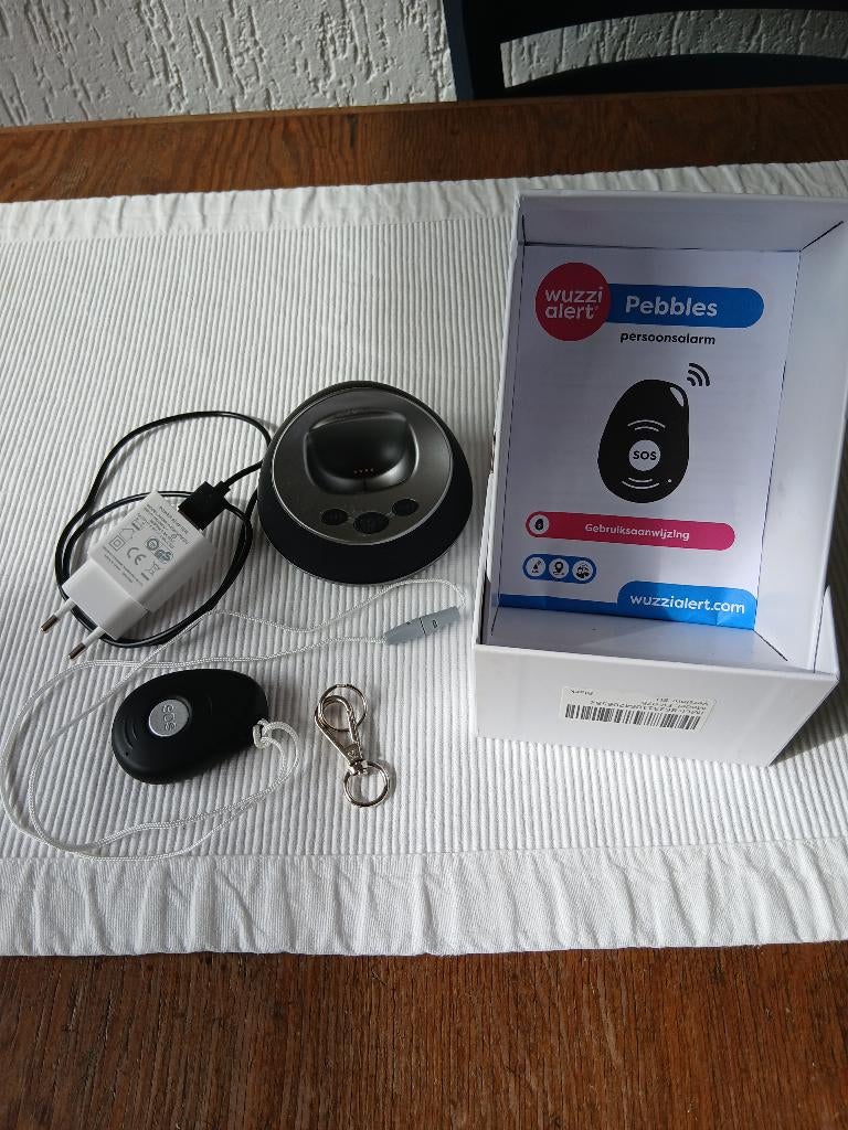 Wuzzi Pebbels alert persoons alarm als nieuw €25,-, Ophalen of Verzenden, Zo goed als nieuw