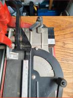 Tegelsnijder tomecanic, Ophalen