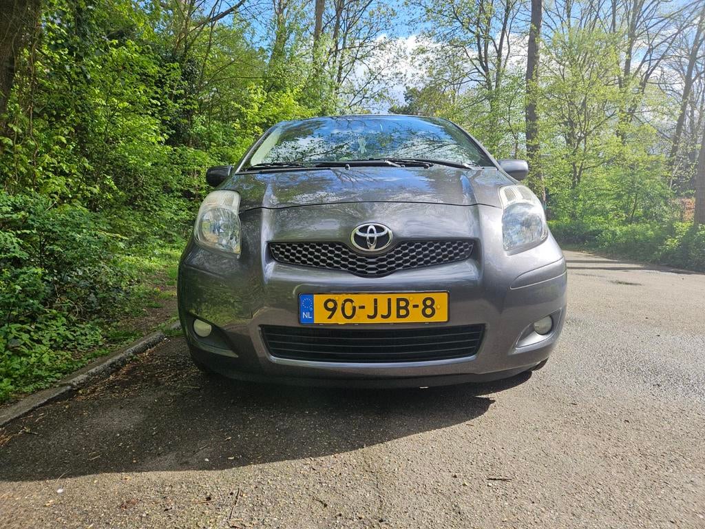 Toyota Yaris 1.3 16V Vvt-i Aspiration 5DR 2009 Grijs, Auto's, Voorwielaandrijving, 1025 kg, Stof, 40 €/maand