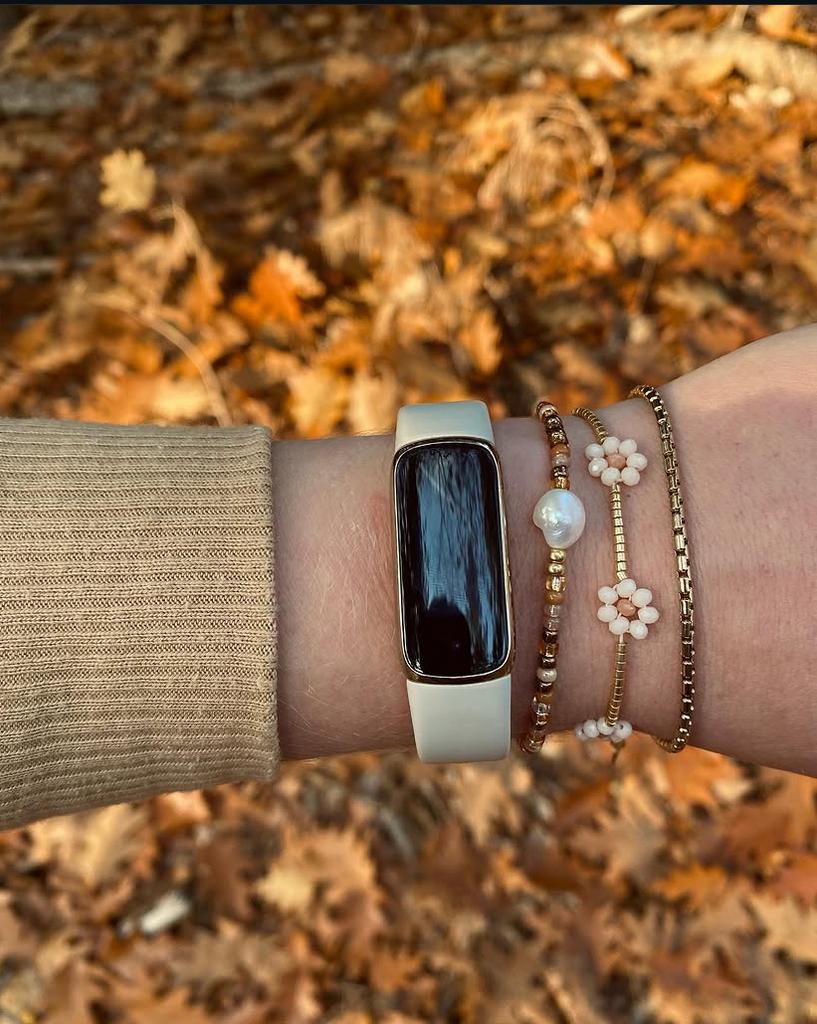 Fitbit Luxe Goud - Stijlvolle Activity Tracker, Ophalen of Verzenden, Waterdicht, Zo goed als nieuw, Geel