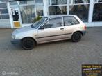 Toyota Starlet 1.3 XL, Auto's, Beige, Origineel Nederlands, Bedrijf, Handgeschakeld