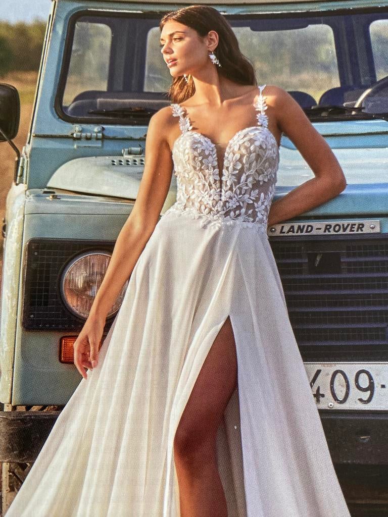 Nieuwe sexy jurk met split. Direct leverbaar! Maat 38,40,42, Ophalen, Nieuw, Wit, Trouwjurk