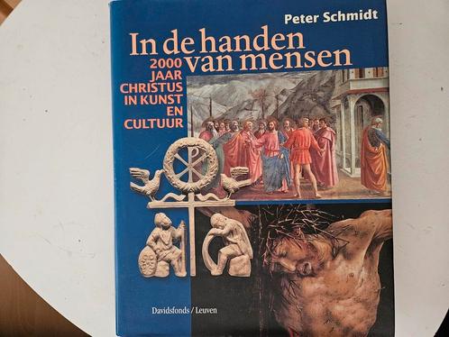 Peter Schmidt - In de handen van mensen, Boeken, Godsdienst en Theologie, Zo goed als nieuw, Ophalen of Verzenden