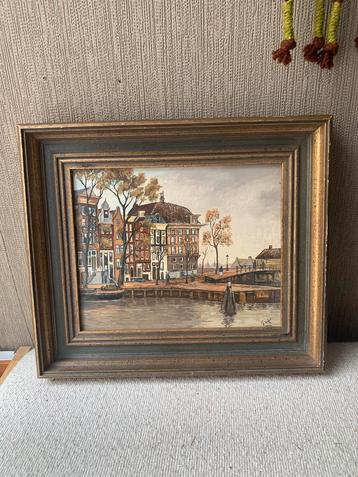 Gesigneerd paneetje olieverf Amsterdam beschikbaar voor biedingen