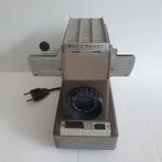 Vintage Bell & Howell - model 707 - Headliner, Audio, Tv en Foto, Diaprojectors, Gebruikt, Ophalen of Verzenden