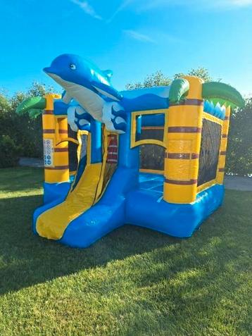 Compact springkussen met glijbaan "Dolfijn" te huur!! beschikbaar voor biedingen