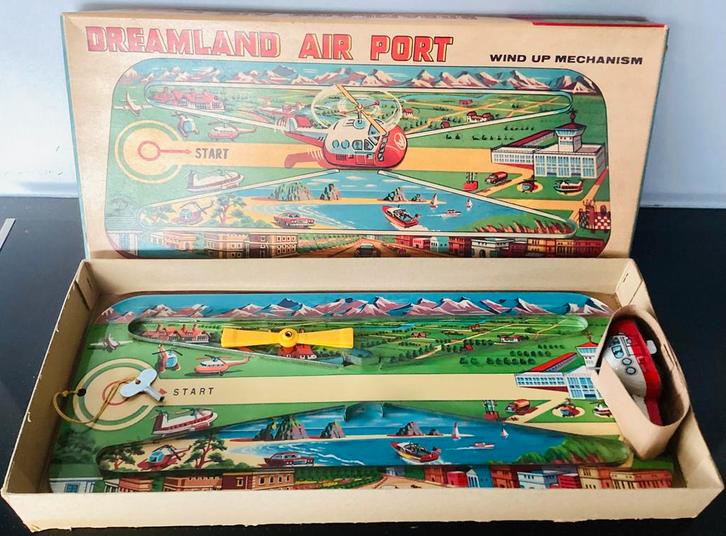 Oude blikken wind-up helicopter baan,Dreamland Air Port,OVP, Antiek en Kunst, Antiek | Speelgoed, Ophalen