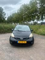 Toyota Aygo 1.0 12V Vvt-i 3DRS MMT 2007 Zwart, Auto's, Voorwielaandrijving, Stof, 4 stoelen, Airbags