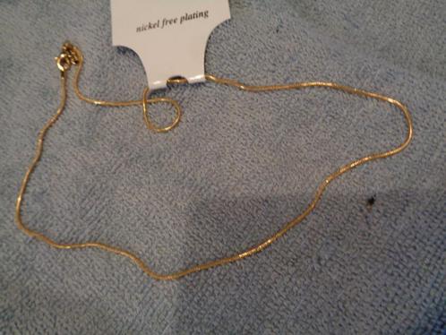 fijn goudkleurige ketting 42 cm lang nr k 5710, Sieraden, Tassen en Uiterlijk, Kettingen, Nieuw, Overige materialen, Goud, Ophalen of Verzenden