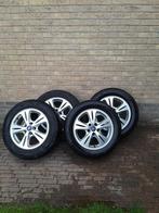 Originele Ford lichtmetalen velgen met winterbanden  16 inch, Ophalen