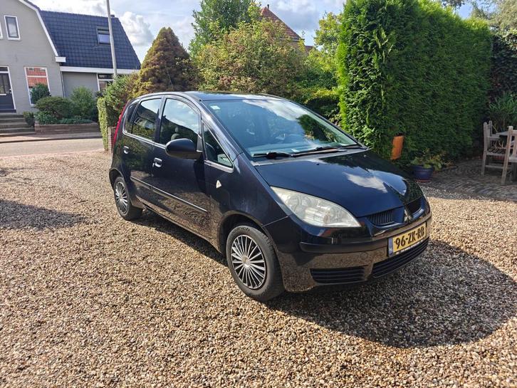 Mitsubishi Colt 1.1 Mivec 2008 Zwart, Auto's, Mitsubishi, Particulier, Colt, Airbags, Airconditioning, Bluetooth, Centrale vergrendeling