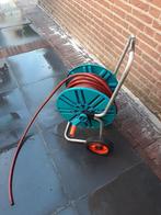 Gardena slangenwagen (haspel op wielen met tuinslang), Tuin en Terras, Tuinslangen, Ophalen of Verzenden, Gebruikt, Tuinslang