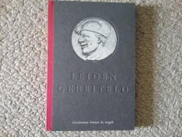 Leiden gebeiteld - gevelstenen binnen de singels (1995) beschikbaar voor biedingen