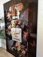Design schilderij van glas Chanel, Ophalen