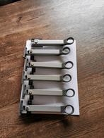 Nog 11 stuks combi uitzetter, Axa, grijs, Ophalen of Verzenden, Zo goed als nieuw, Rvs, Slot