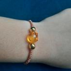 Gouden kralen armband met oranje kristal, Met kristal, Nieuw, Ophalen of Verzenden, Elastiek
