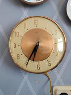 Vintage Brons Metamec elektrische wandklok jrn 60, Ophalen of Verzenden, Gebruikt