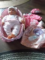 Babypop 48 cm met reiswieg en kleertjes, Ophalen, Zo goed als nieuw, Babypop