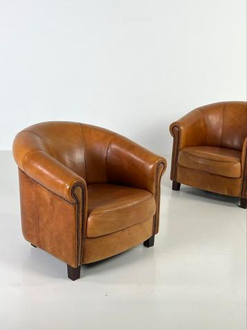 GEZOCHT! Schapenleren fauteuils en banken beschikbaar voor biedingen