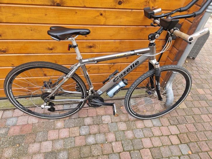 Te koop, mooie gazelle Puerto hybride sportfiets, Fietsen en Brommers, Fietsen | Heren | Sportfietsen en Toerfietsen, Gebruikt
