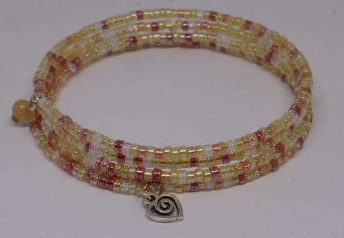Spiraalarmband met rocailles in zachte tinten, o.a. oranje, Sieraden, Tassen en Uiterlijk, Armbanden, Nieuw, Oranje, Ophalen of Verzenden