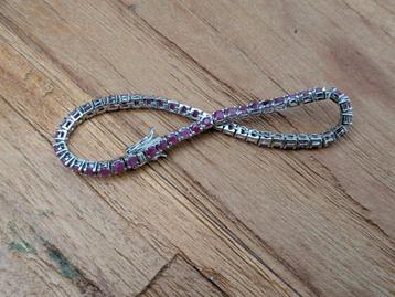 Zilveren armband met paarse stenen  beschikbaar voor biedingen