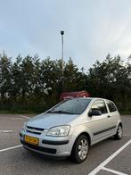 Hyundai Getz 1.1 5DRS 2006 Grijs, Auto's, Voorwielaandrijving, 450 kg, 4 cilinders, Origineel Nederlands
