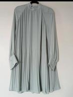 Nieuwe gepliceerde turquoise gevoerde jurk., H&M, Overige kleuren, Maat 42/44 (L), Nieuw