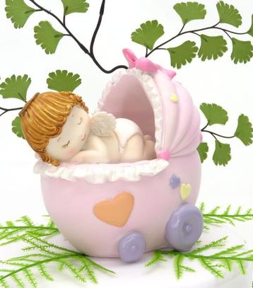 Zeer mooie slappende baby in roze kinderwagen. beschikbaar voor biedingen