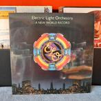 Lp E.L.O a New world record, Ophalen of Verzenden, Zo goed als nieuw, 12 inch
