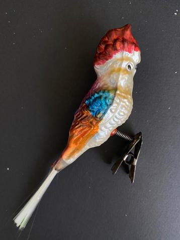 Oude kerstbal kaketoe op knijper beschikbaar voor biedingen