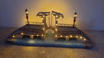 Kerstdorp hefbrug met verlichting beschikbaar voor biedingen