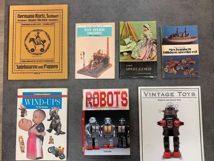 Boeken Robot, Wind-Ups, Poppen, Tin Toys, Blik, Boeken, Hobby en Vrije tijd, Zo goed als nieuw, Overige onderwerpen, Ophalen of Verzenden