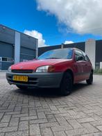 Toyota Starlet 1.3 16V AUT 1997 Rood, Auto's, Automaat, 4 cilinders, Starlet, 400 kg