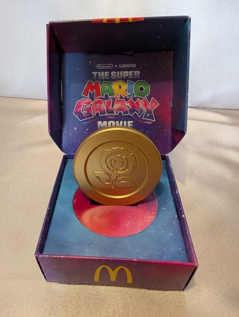 Super Mario Galaxy Movie McDonald's Munt - Nieuw in doos, Verzamelen, Speelgoed, Ophalen of Verzenden, Nieuw