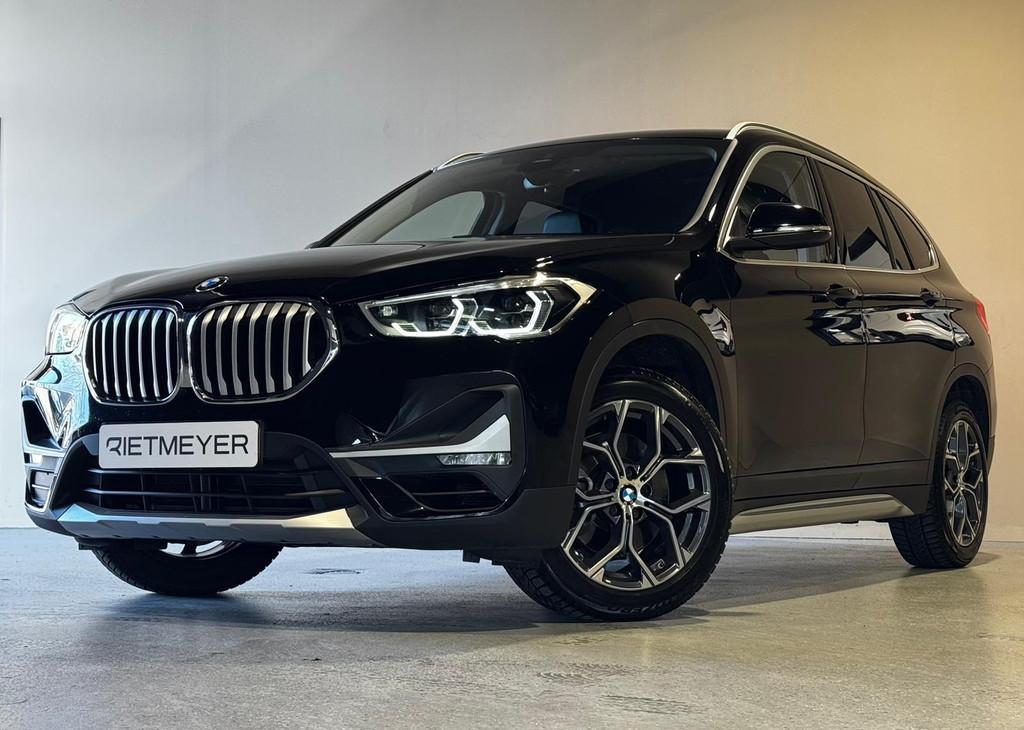 BMW X1 sDrive20i High Executive |Head-Up |Trekhaak |Sfeer |D, Auto's, BMW, 4 cilinders, Leder en Stof, Zwart, Origineel Nederlands