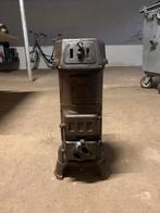 Ouwe houtkachel, Ophalen