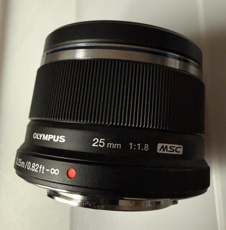 Olympus M.Zuiko Digital 25mm f/1.8 zwart ZGAN, Verzamelen, Fotografica en Filmapparatuur, Lens of Lenzen, 1980 tot heden, Ophalen of Verzenden