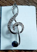 Muzieksleutel broche zilverkleurig nieuw, Overige materialen, Overige voorstellingen, Nieuw, Ophalen of Verzenden