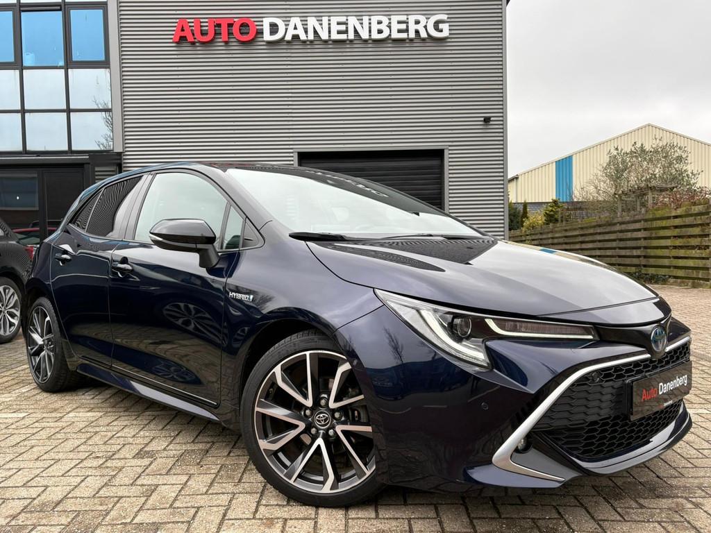 Toyota Corolla 1.8 Hybrid GARANTIE, Auto's, Zwart, Blauw, Corolla, 122 pk