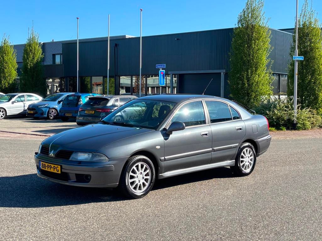 Mitsubishi Carisma 1.6 Platinum Edition Airco Nieuwe Apk Inr, Auto's, Voorwielaandrijving, 4 cilinders, Euro 4, Zilver of Grijs