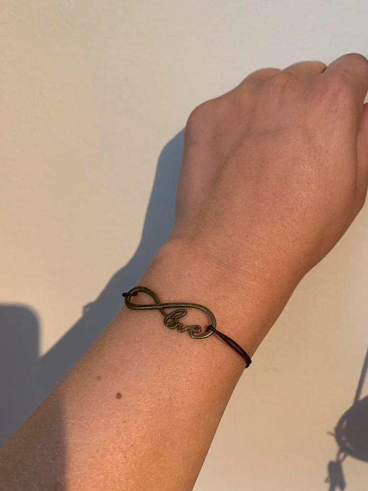 Lief, Sieraden, Tassen en Uiterlijk, Armbanden, Nieuw, Elastiek, Bruin, Ophalen of Verzenden