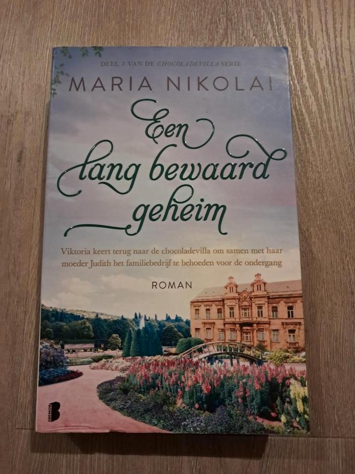Maria Nikolai - Een lang bewaard geheim, Boeken, Literatuur, Zo goed als nieuw, Europa overig, Ophalen of Verzenden